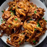A plate of pakoras shared by Burger Delish